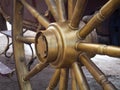 Close up of antique vintage wood wagon wheel Royalty Free Stock Photo