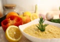 Close-up appetizing lentil porridge in a white dish on a light kitchen countertop. Top down. Healthy eating concept. Royalty Free Stock Photo