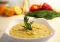 Close-up appetizing lentil porridge in a white dish on a light kitchen countertop. Top down. Healthy eating concept. Royalty Free Stock Photo