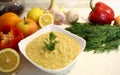 Close-up appetizing lentil porridge in a white dish on a light kitchen countertop. Top down. Healthy eating concept. Royalty Free Stock Photo