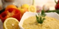 Close-up appetizing lentil porridge in a white dish on a light kitchen countertop. Top down. Healthy eating concept. Royalty Free Stock Photo