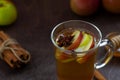 Apple cider with fresh apples and honey. Hot fruit tea with spices Royalty Free Stock Photo