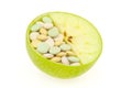 Close up of apple and pills isolated Royalty Free Stock Photo