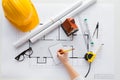 Close up of architect hand with blueprint Royalty Free Stock Photo