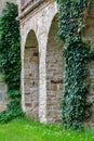 close up of architectural details, old stone wall with arches and doors Royalty Free Stock Photo