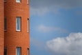 Close-up of architectural details and window of an old building against the blue sky, background or concept Royalty Free Stock Photo