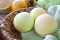 Close up aromatherapy spa concept with bath bombs and fresh lemons. Royalty Free Stock Photo