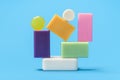 Multicolored soaps stack on a blue background. Variety of colorful soaps Royalty Free Stock Photo