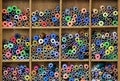 Close up of an array of colorful spools of thread in different sizes and varieties. Royalty Free Stock Photo