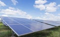 Array of thin film solar cells or amorphous silicon solar cells in solar power plant turn up skyward absorb the sunlight from the