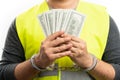 Close-up of arrested constructor in handcuffs holding cash money Royalty Free Stock Photo