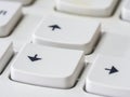 Close up of arrow keys on white keyboard of modern laptop Royalty Free Stock Photo