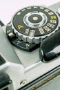 A close up of a asa iso dial on a 35mm camera