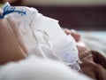 Close up asia boy making inhalation with nebulizer mask at the hospital Royalty Free Stock Photo