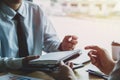 Close-up. Asian business of hand holding pen reviewing and signing,Home buying contract,Selective focus Royalty Free Stock Photo