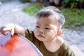 Close up of Asian child boy`s face with tears. Upset crying and mad little toddler boy.