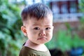 Close up of Asian child boy`s face with tears. Upset crying and mad little toddler boy. Eye drop,