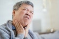 Elderly man has sore throat