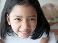 Close up a asian girl looking up a camera Royalty Free Stock Photo