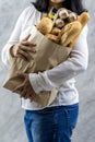 Close up Asian housewife woman hold grocery dairy bag