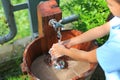 Close-up asian little child girl washing hands in water sinks