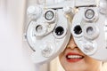 Close up asian middle age woman eye exam with diagnostic ophthalmology in optical clinic. Royalty Free Stock Photo