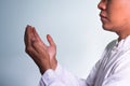 Close Up Asian Muslim man praying side view