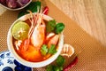 Close up Asian Spicy soup with shrimp in bowl , famous Thai foo