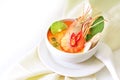 Close up Asian Spicy soup with shrimp in white bowl , famous Thai food cuisine calling Tom Yum Kung Royalty Free Stock Photo
