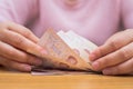 Close up of asian woman with calculator counting money.Woman calculate the spending at home Royalty Free Stock Photo