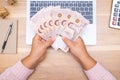 Close up of asian woman with calculator counting money.Woman calculate the spending at home Royalty Free Stock Photo