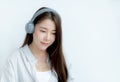 Close up of Asian woman portrait with headphones looking straight ahead Royalty Free Stock Photo