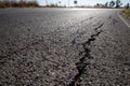 Close up of asphalt road surface crack Royalty Free Stock Photo