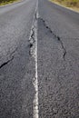 Close up of asphalt road surface crack Royalty Free Stock Photo