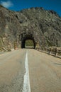 Close-up of asphalt on road with tunnel Royalty Free Stock Photo