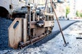 Close-up of asphalting machinery and tools working Royalty Free Stock Photo