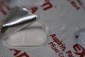 Close up of an Aspirin Pill in Packaging