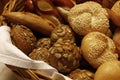 Close up assorted fresh bread buns in basket Royalty Free Stock Photo