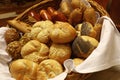 Close up assorted fresh bread buns in basket Royalty Free Stock Photo