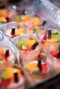 Close up of assorted fruit desserts in tray Royalty Free Stock Photo