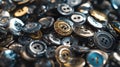 Close-up of assorted metal and plastic buttons with various designs and textures Royalty Free Stock Photo