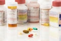 Close up of assorted pills and prescriptions Royalty Free Stock Photo
