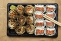 Close up of assorted sushi with chopsticks on the table Royalty Free Stock Photo