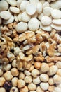 Close-up of an assortment of mixed dry fruit. The texture of walnuts, almonds, and hazelnuts as a background. Royalty Free Stock Photo