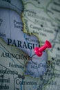 Close up of AsunciÃÂ³n, Paraguay pin pointed on the world map with a pink pushpin Royalty Free Stock Photo