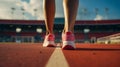 Close up of an athlete's feet wearing sports shoes on a challenging track. Trail running workout on on stadium Royalty Free Stock Photo