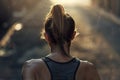 Close-up of an athletic woman running in sportswear