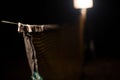 Close up of an attached badminton net on a dark background Royalty Free Stock Photo