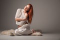 Gorgeous ginger woman on lilac background