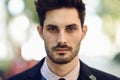 Close-up of attractive man in the street in formalwear.